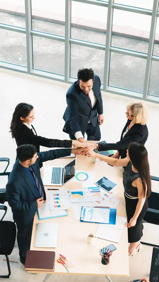 vertical-business-background-group-people-having-hand-touch-together-to-show-teamwork-unity-meeting-office-170540518